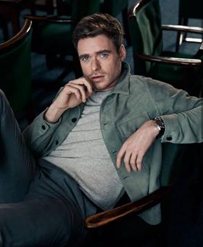 Image may contain: 1 person, sitting